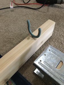 warping trapeze - top hook for storing the adjustable top bar