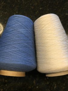weaving fibers: blue wool for the weft and white silk for the warp